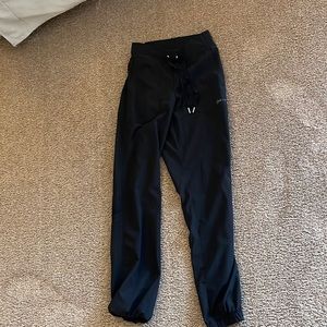 Black scrubs - worn once. Some minor pilling from the wash. Brand is +FIT